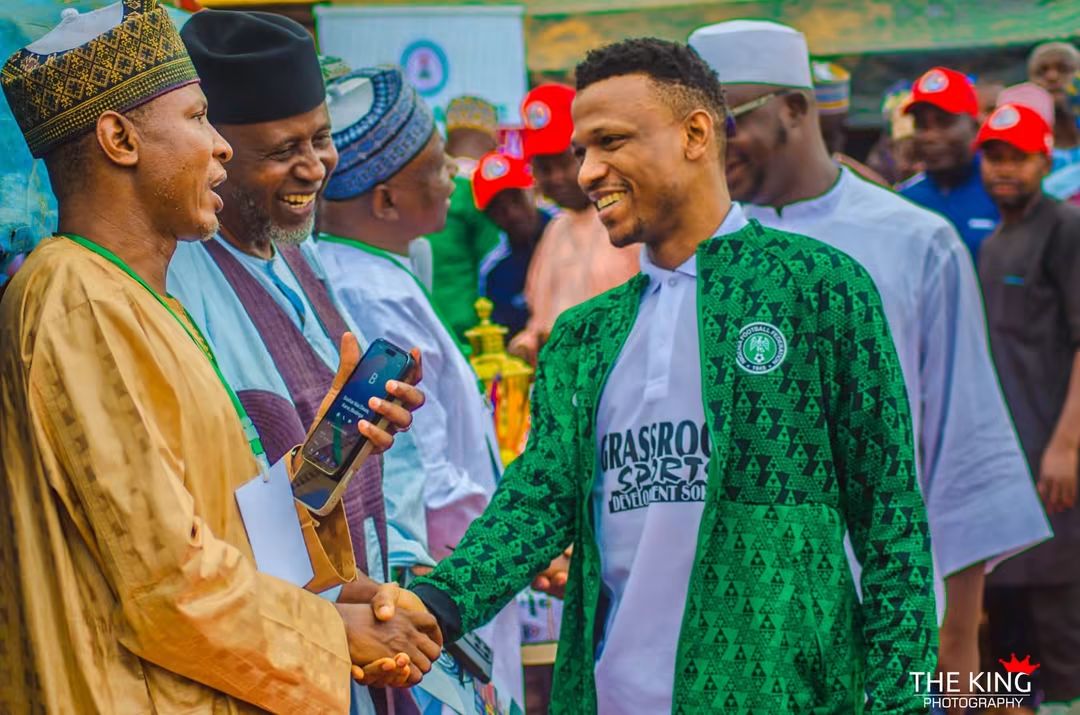 Handshake with supporters at a youth mobilisation event