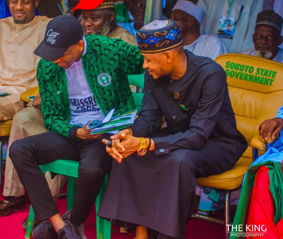 Director of Youth and Sports with a movement official at an event